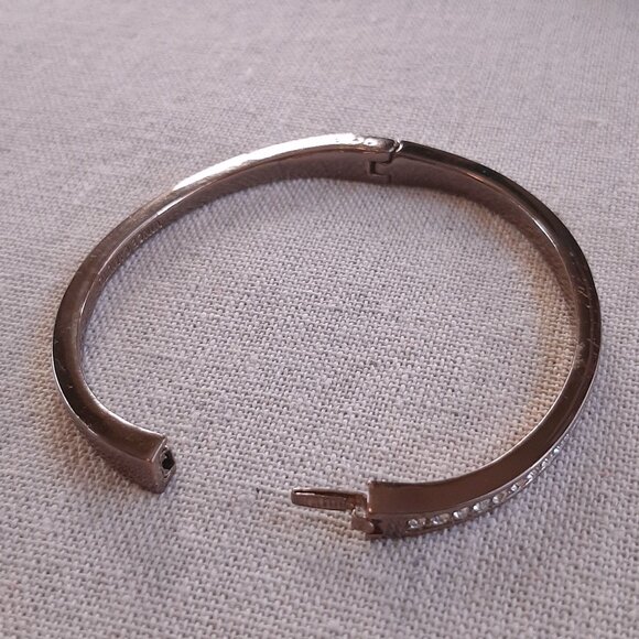 Vince Camuto Dark Shiny Bronze Rhinestone Channel Set Oval Bangle - Picture 3 of 10